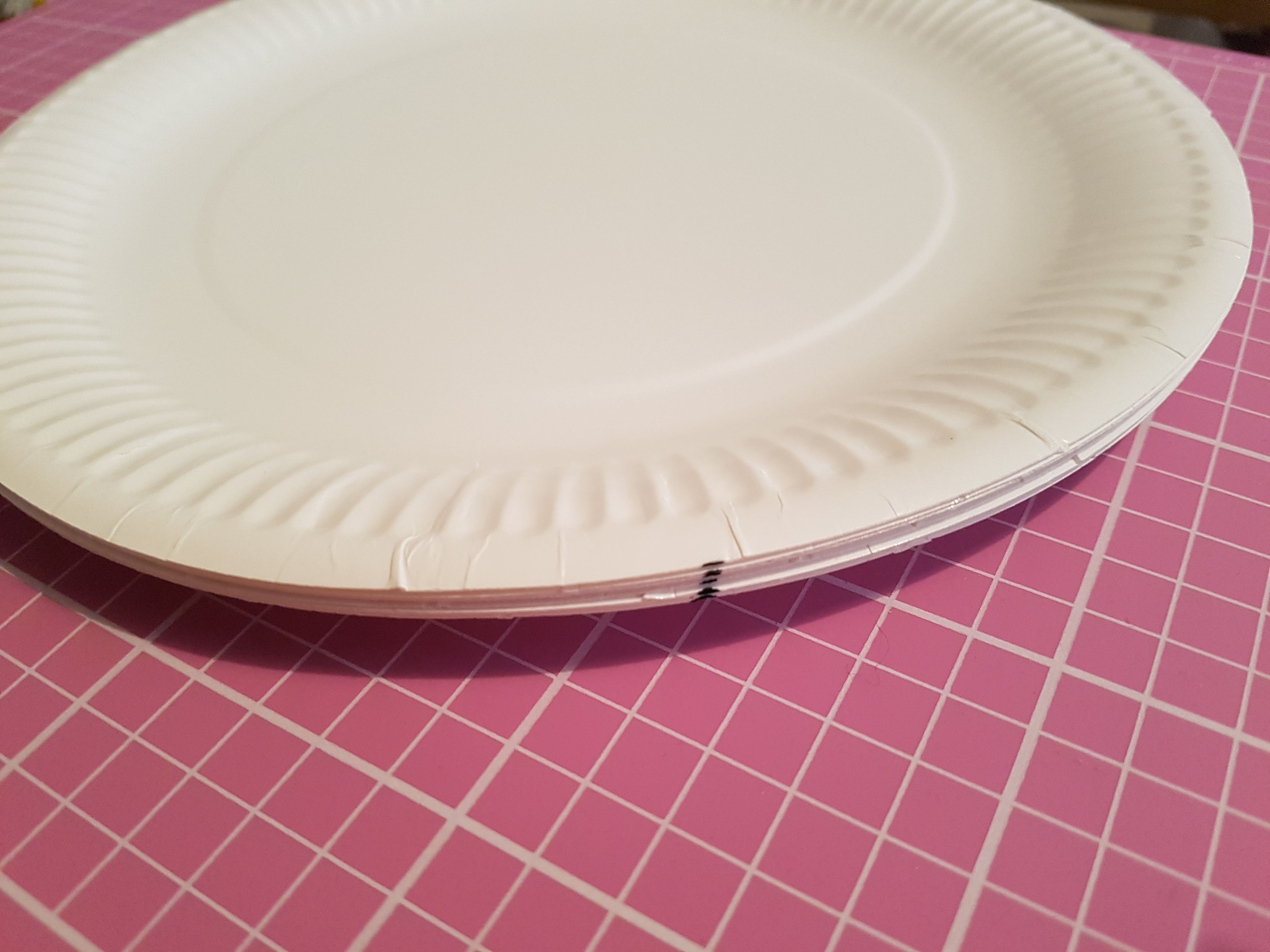 Stack of plates with a line marked down the side