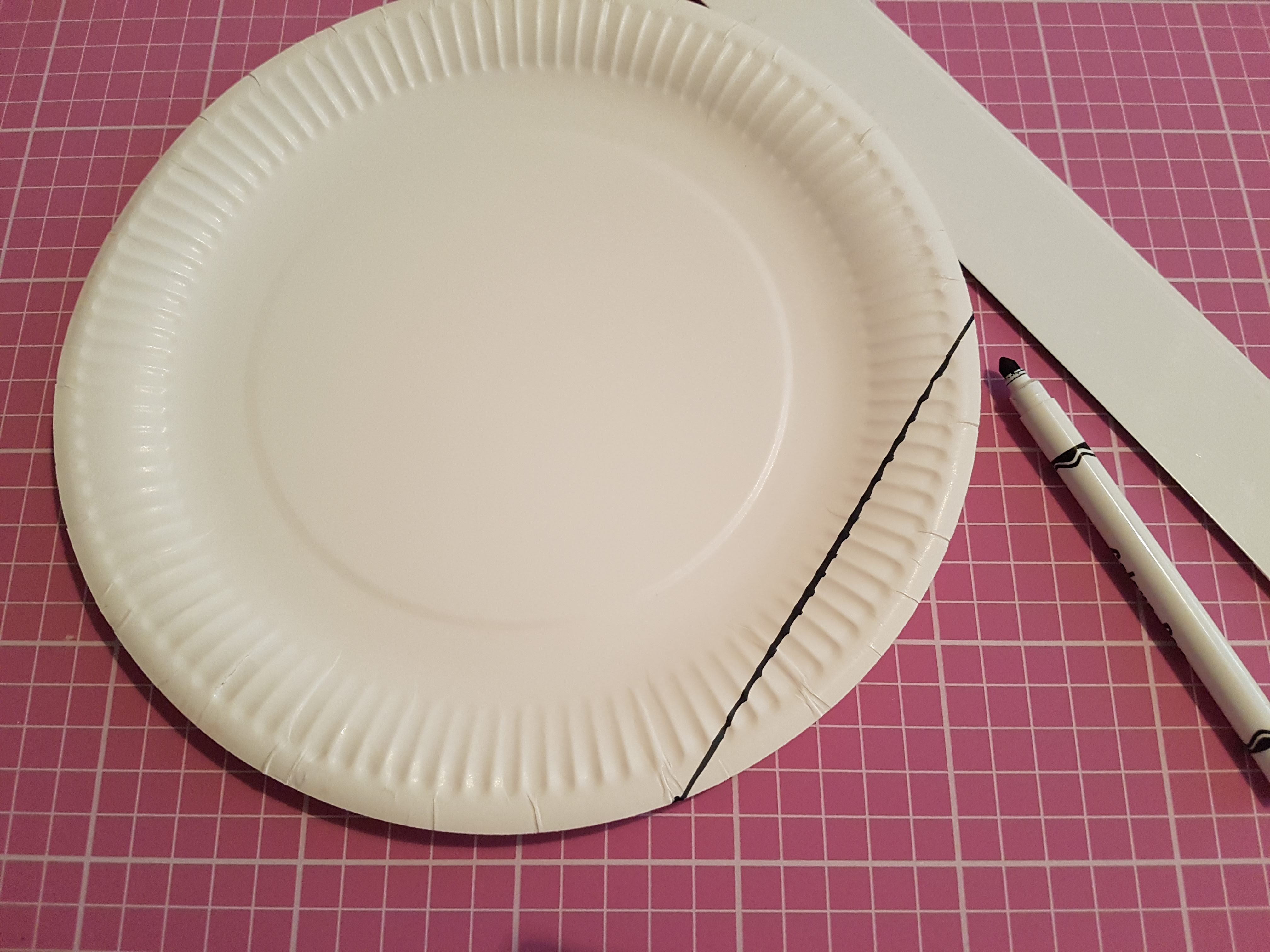 paper plate with a chord drawn